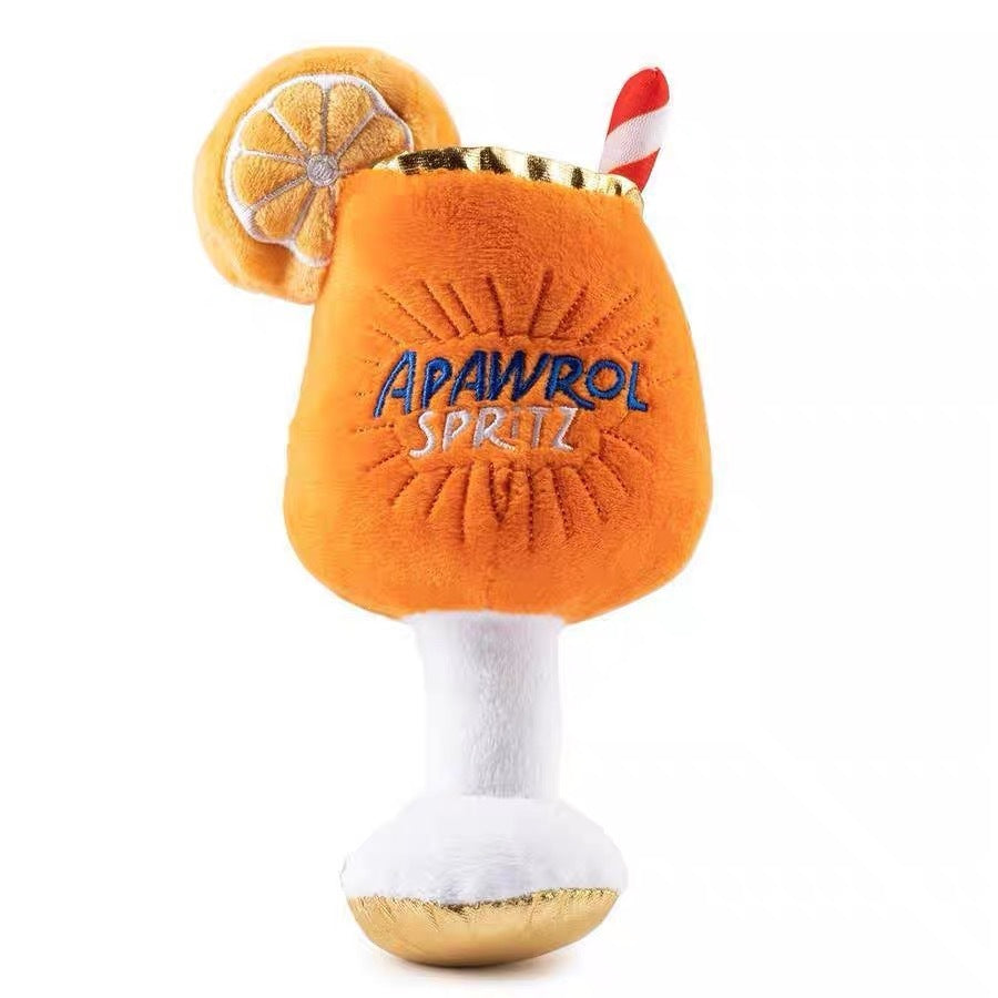Plush orange dog chew toy shaped like a cocktail glass with lemon slice and straw detailing