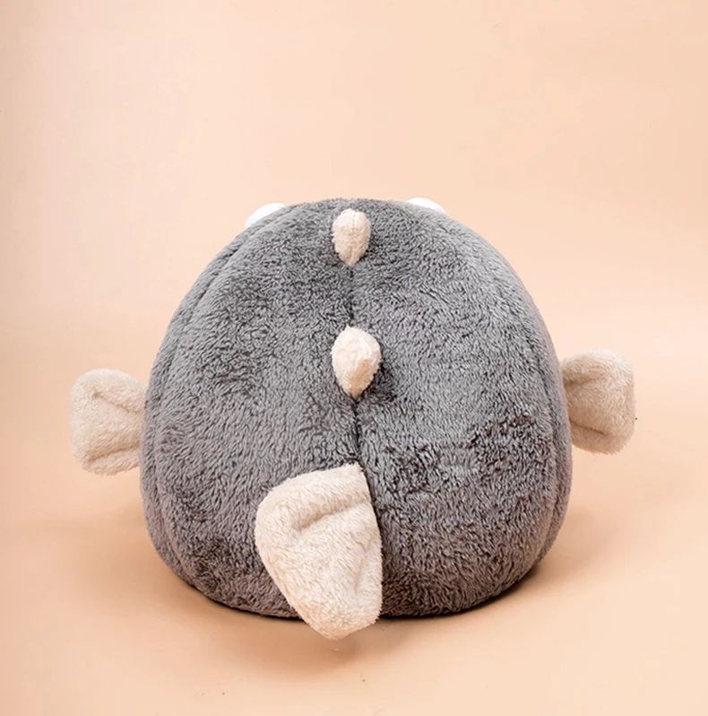 Soft plush pet mat shaped like a balloon fish, combining cozy luxury with modern pet furniture design.