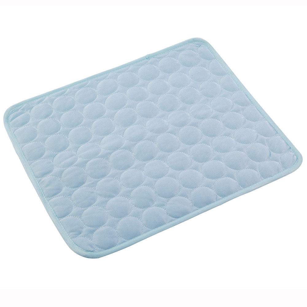 Light blue quilted cooling mat designed for pets, combining comfort and luxury for home interiors.
