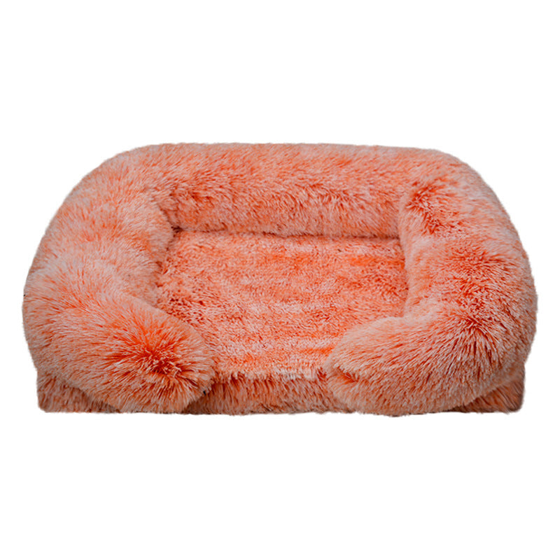 Plush square pet bed in soft coral fabric with removable, washable cover for cozy indoor comfort