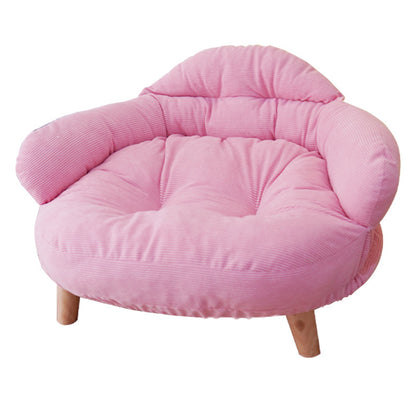 Cozy pink off-ground wooden pet bed with plush cushioning, blending luxury with modern style.