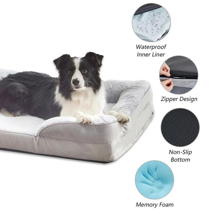 Large black and white dog resting on a gray orthopedic pet bed with waterproof and non-slip features