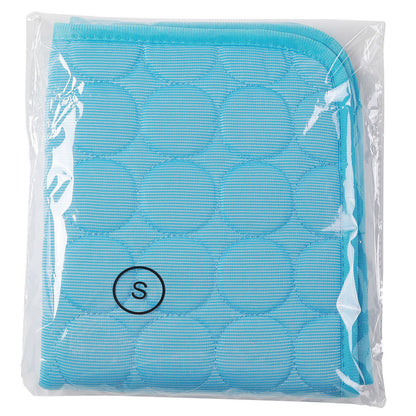 Light blue cooling pet mat with quilted texture, designed for comfort and durability in luxury pet furniture.
