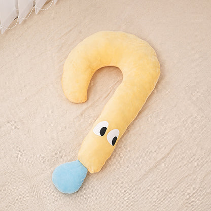 Curved plush pet pillow in soft yellow and blue with playful eyes, ideal luxury cushion for small pets.
