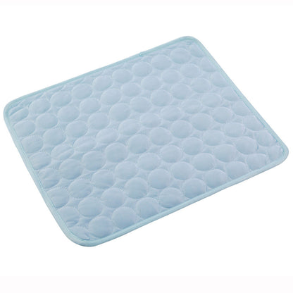 Light blue quilted cooling mat designed for pets, combining comfort and luxury for home interiors.