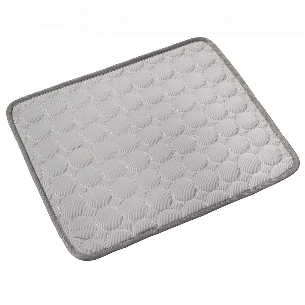 Luxury cooling pet mat with quilted texture, designed for comfort and style in modern homes.