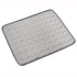 Luxury cooling pet mat with quilted texture, designed for comfort and style in modern homes.
