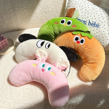 Set of colorful U-shape pillows with playful animal faces, designed for pet comfort and modern home decor.